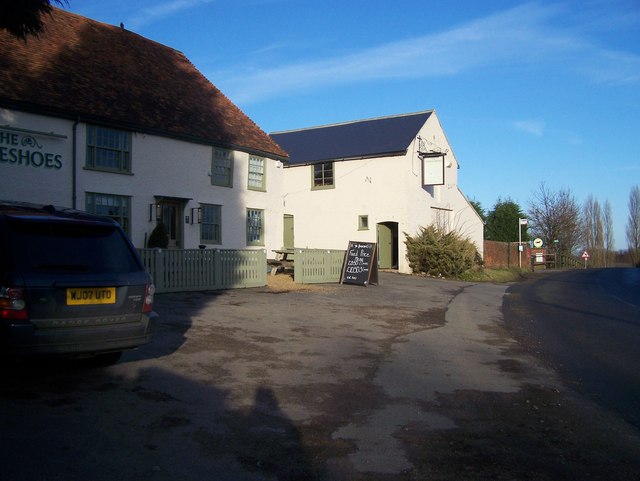 near to Coxheath, Kent, Great Britain. The Horseshoes Inn, West Farleigh. On slight bend in Dean Street. Further up the hill is Horseshoe Riding School.