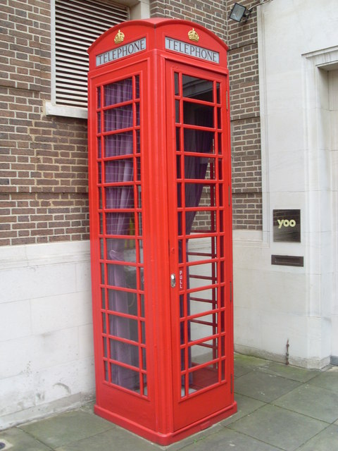 Telephone Box Outside Flats In Hall      U00a9 David Hillas