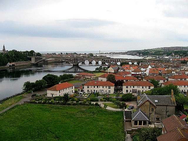 Green and Housing Estate at Berwick-upon-Tweed as seen from a train on the 