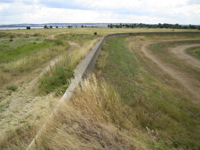 With the River Thames to the left and East Tilbury Marshes to the right.