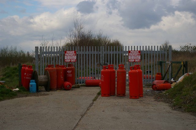 The showmen mentioned on the sign own much of the land off Buckles Lane and use it for their winter base before travelling the country during the summer 