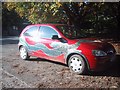 Dragon-painted car outside the Tavistock Arms, Poundsgate