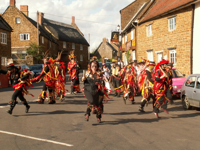 Adderbury High Street with Morris Dancers