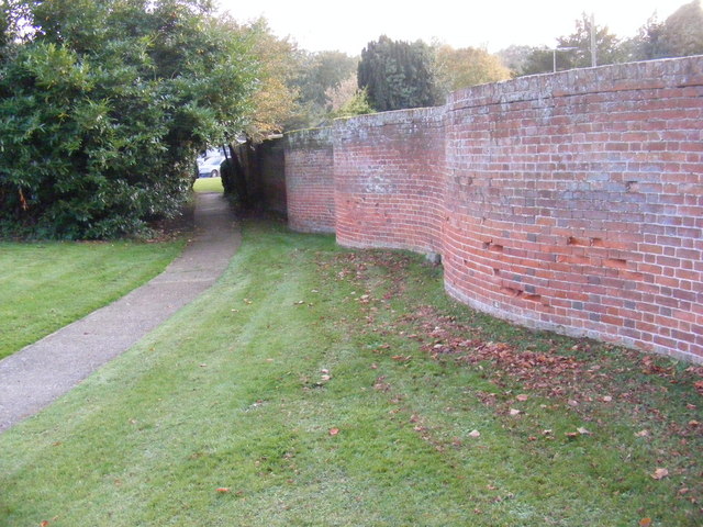 The entrance to All Saints Church and the wiggly wall