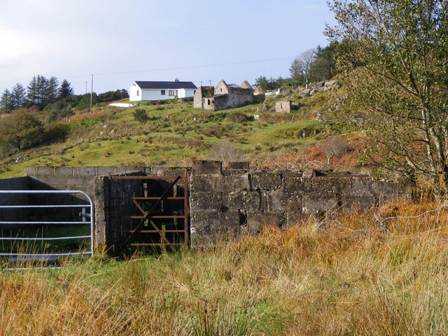 Ruined buildings on the horizon and cattle pens in the foreground - Ardmeen Townland