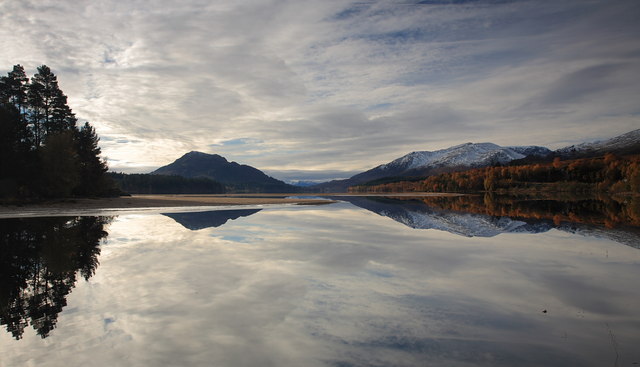 Reflections on Loch Laggan and sandbar.