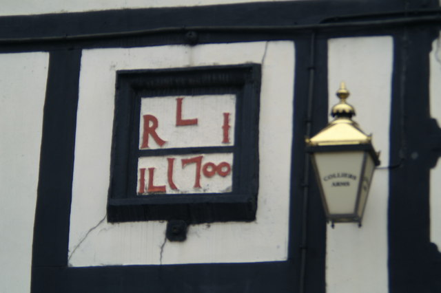 Date plate above the door of the Colliers Arms, Aspull
