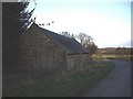 A steading by road near Pitfichie Castle.