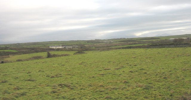 View across grazing land towards the railway by Eric Jones