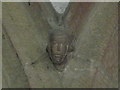 NZ0863 : St. Mary's Church, Ovingham - carved face at base of nave arch (2) by Mike Quinn