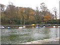 Boats in the Seiont estuary with late Autumn colours in the background