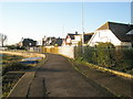 Solent Way passing houses in Longshore Way