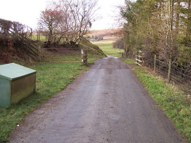 Cattle grid and bin holder at the end of the council road
