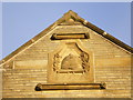 Detail on the gable end of the former Co-op building, Towngate, Clifton