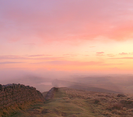 Crag Lough and Steel Rigg in a misty sunrise