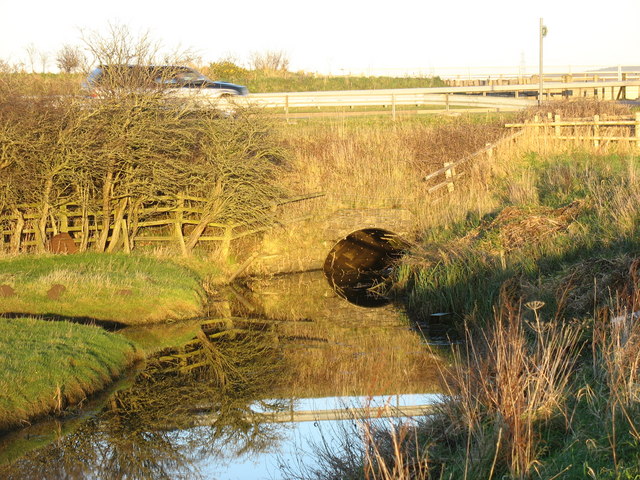 Culvert carrying the western drainage channel below the A5