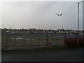 Boeing 777 lands over Rothesay Dock East