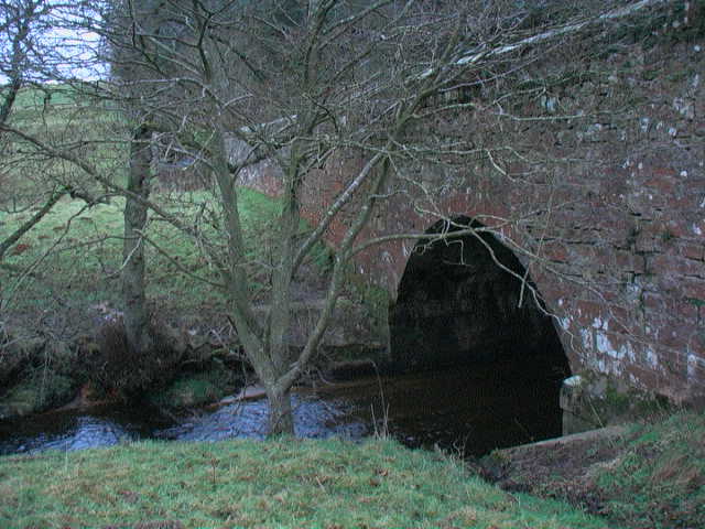 Estate boundary wall bridges stream