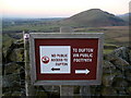 NY6927 : Sign on access land with Knock pike in the background by Phil Catterall