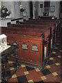 Ancient pews within  St Mary