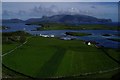 NG2605 : Fields above the square on Canna by Alastair Young