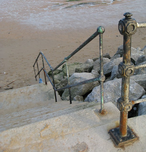 Victorian railings and steps to the sea
