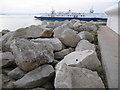 Sandbanks: face carved in boulder