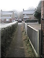 Footpath from Rowlands Castle Golf Club emerges into Castle Road