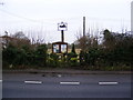TM1160 : Stonham Parva Village Sign by Geographer