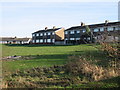 Houses on Ash Road overlooking playing field