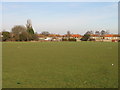 Houses on The Crescent, Aylesham, overlooking playing field