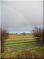 Hazelbury Bryan: rainbow viewed through a gateway