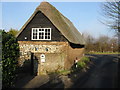 Thatched property on junction of Saunders Lane with Sandwich Road