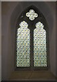 Unusual stained glass window above the altar at Holy Trinity, Duncton