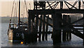 TM0619 : Old jetty and boat by Bob Jones