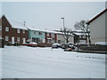 The junction of Elkstone and Winchcombe Roads in the snow