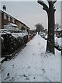 Footprints in the snow in Leominster Road