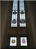 SU9850 : Stained glass windows on the north wall of Guildford Cathedral (1) by Basher Eyre