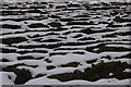 Snow on a ploughed field