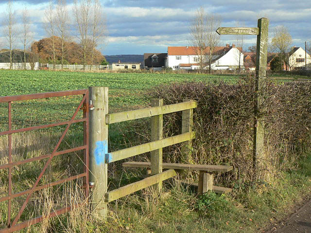 Stile and signpost