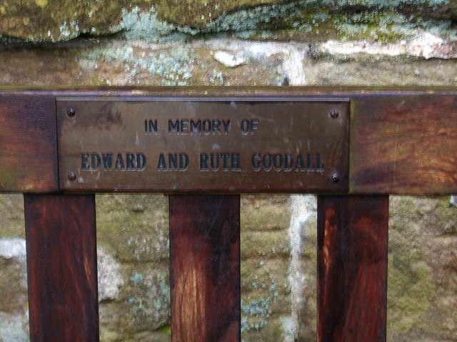 Memorial plaque on seat in St. Saviour's churchyard
