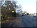 Road sign on approach to M77