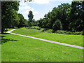 Open public area alongside Tiddy Brook parallel with A386