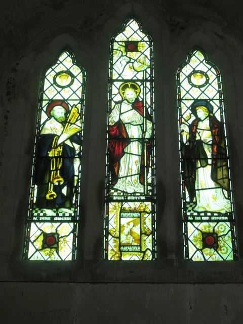 Stained glass windows above the altar at St Peter ad Vincula, Colemore