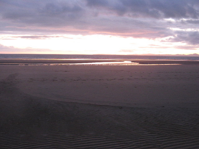 The evening light reveals beach features