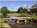 Very old stone footbridge over river at Lower Slaughter