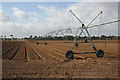 TL7575 : Irrigation system in field next to the B1112 by Bob Jones