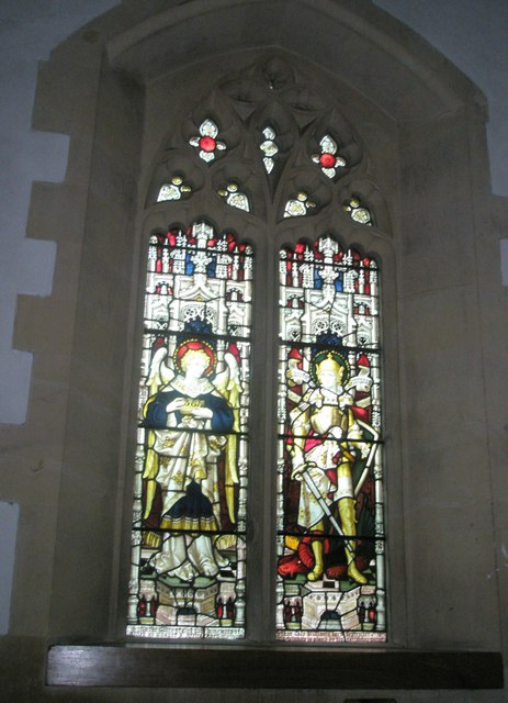 Stained glass window near the font at Holy Trinity, Blendworth