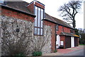 A flint, tile & brick building, Hawkley