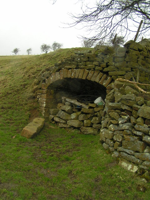 Opening within field wall near Middlesmoor boundary sign